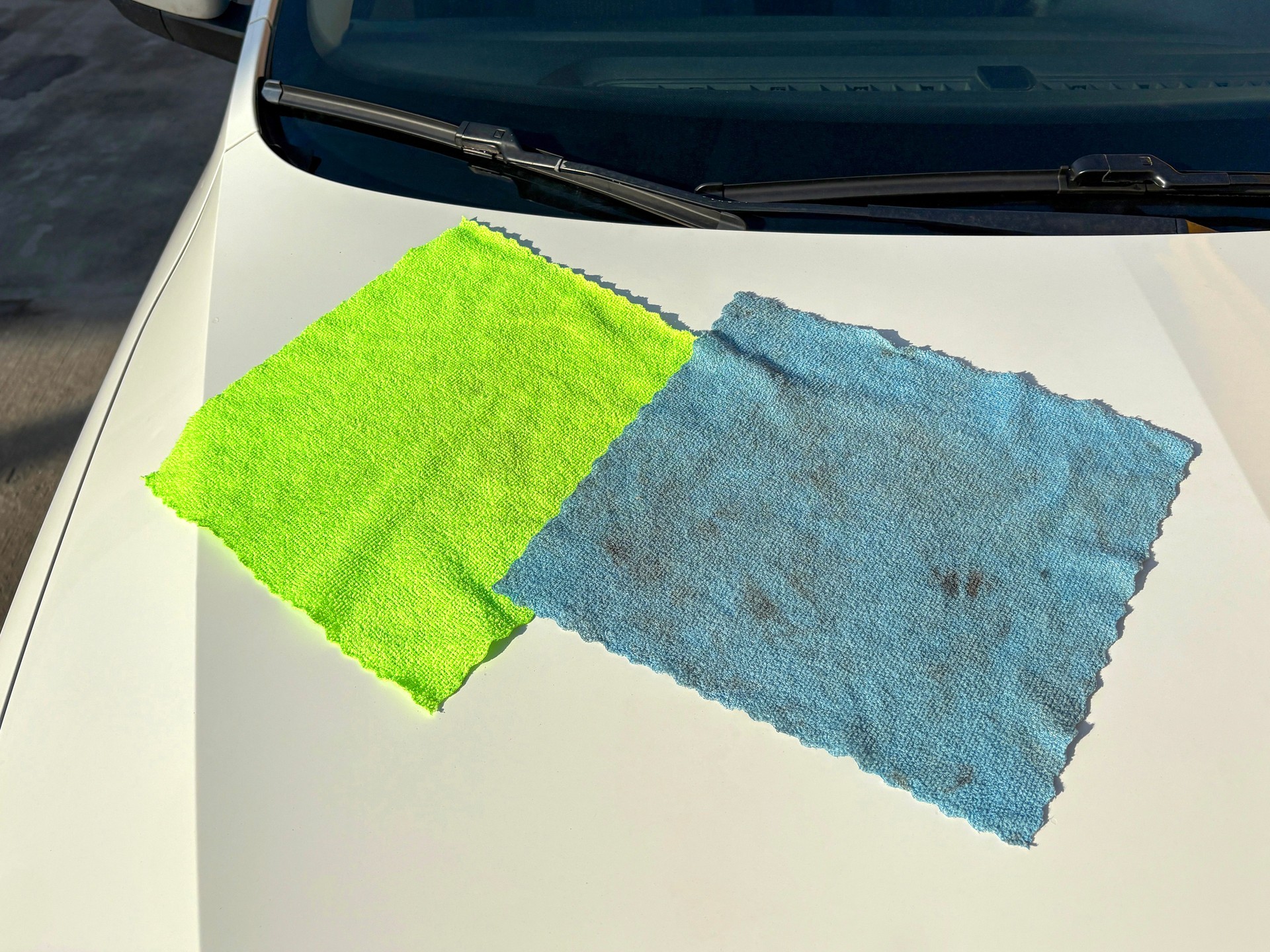 Microfiber cleaning cloth on the car